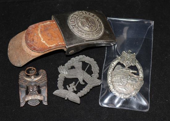 Three WWII German medals / badges and a belt buckle